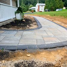Extensive-Outdoor-Re-Design-Hardscape-Walkway-Retaining-Wall-Planting-Design-and-Landscape-Services-in-Shelton-CT 1